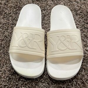 YOUNG AND RECKLESS CREAM COLORED SLIDES. Size 7.5 (41) new never been used.